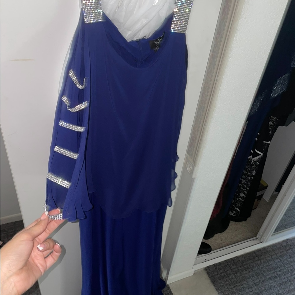Blue rhinestone jumpsuit.